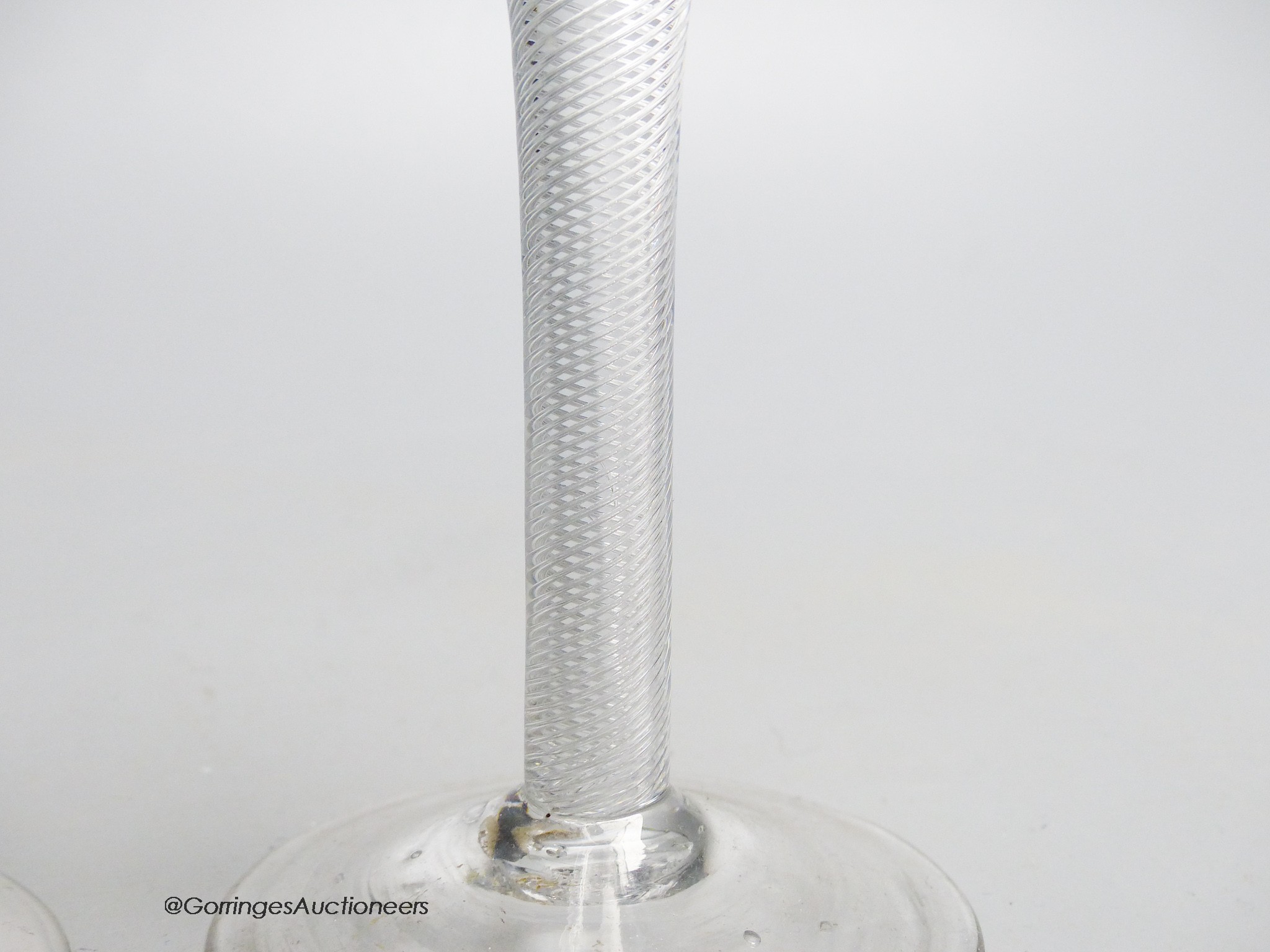 A Georgian air twist stem wine glass and an air twist stem drawn trumpet ale glass, c.1750, tallest 19cm